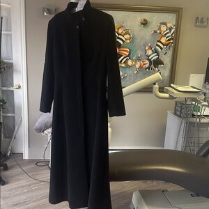 Long black tapered coat,made in France size M